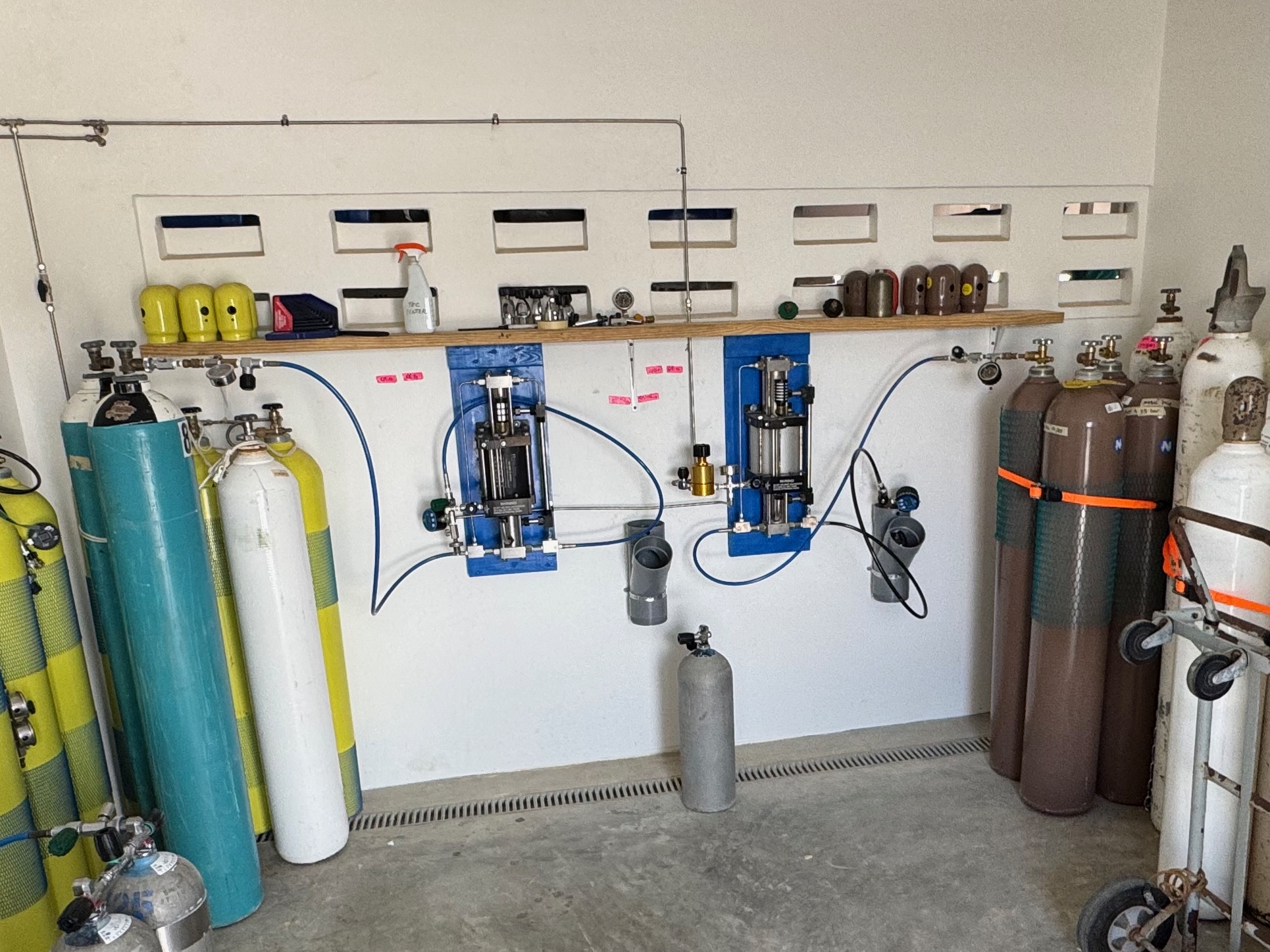 Gas blending station with booster pumps and bank cylinders