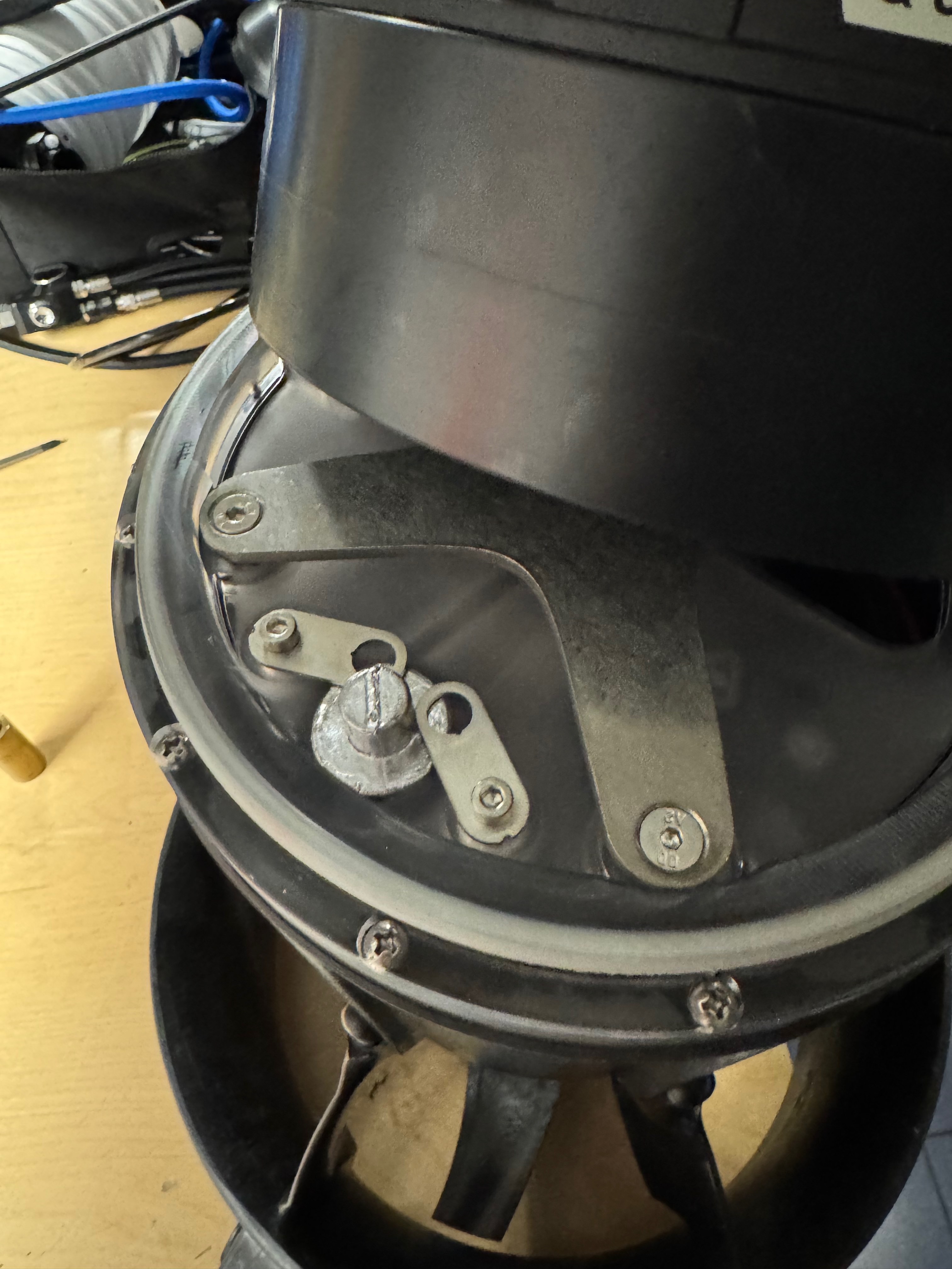 Nosecone bay fully open with the retaining bracket and ballast seat visible